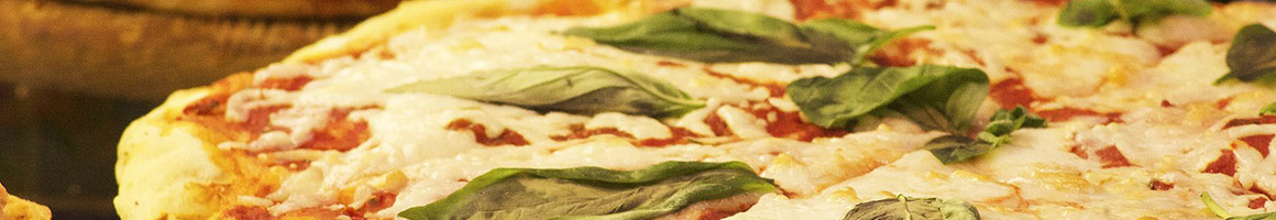 Eating Italian Pizza Sandwich at Glastonbury Pizza House restaurant in Glastonbury, CT.
